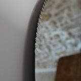 Large vintage chiseled round mirror