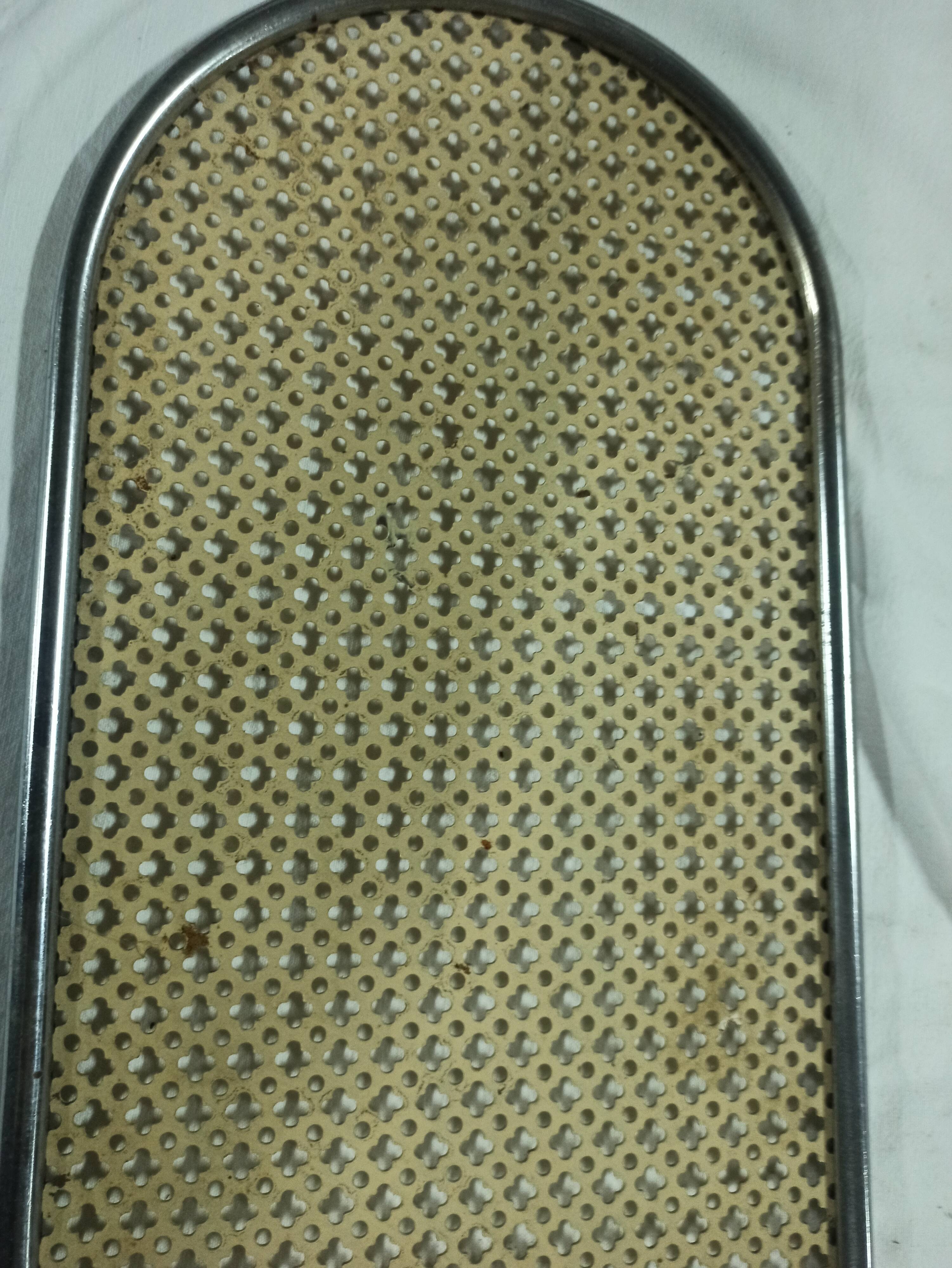 Yellow perforated iron plate top