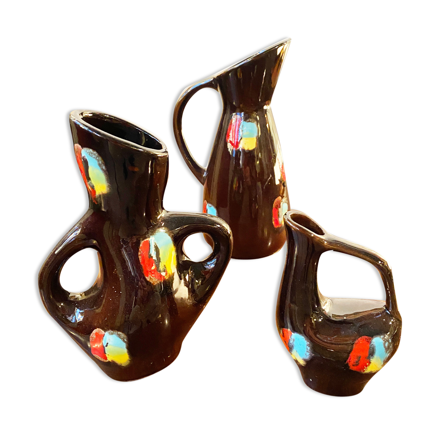 Set of three ceramic pitchers