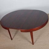 Round extendable dining table in Rio rosewood, 1960
