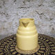 Pastel yellow ceramic pitcher