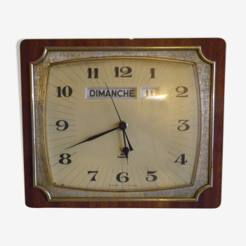 Clock in formica front and back, gold metal, with day and date Mark Jaz Transistor - 60s