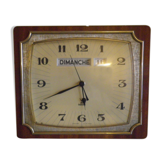 Clock in formica front and back, gold metal, with day and date Mark Jaz Transistor - 60s