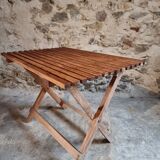 Vintage folding garden table in pine, mid-20th century.