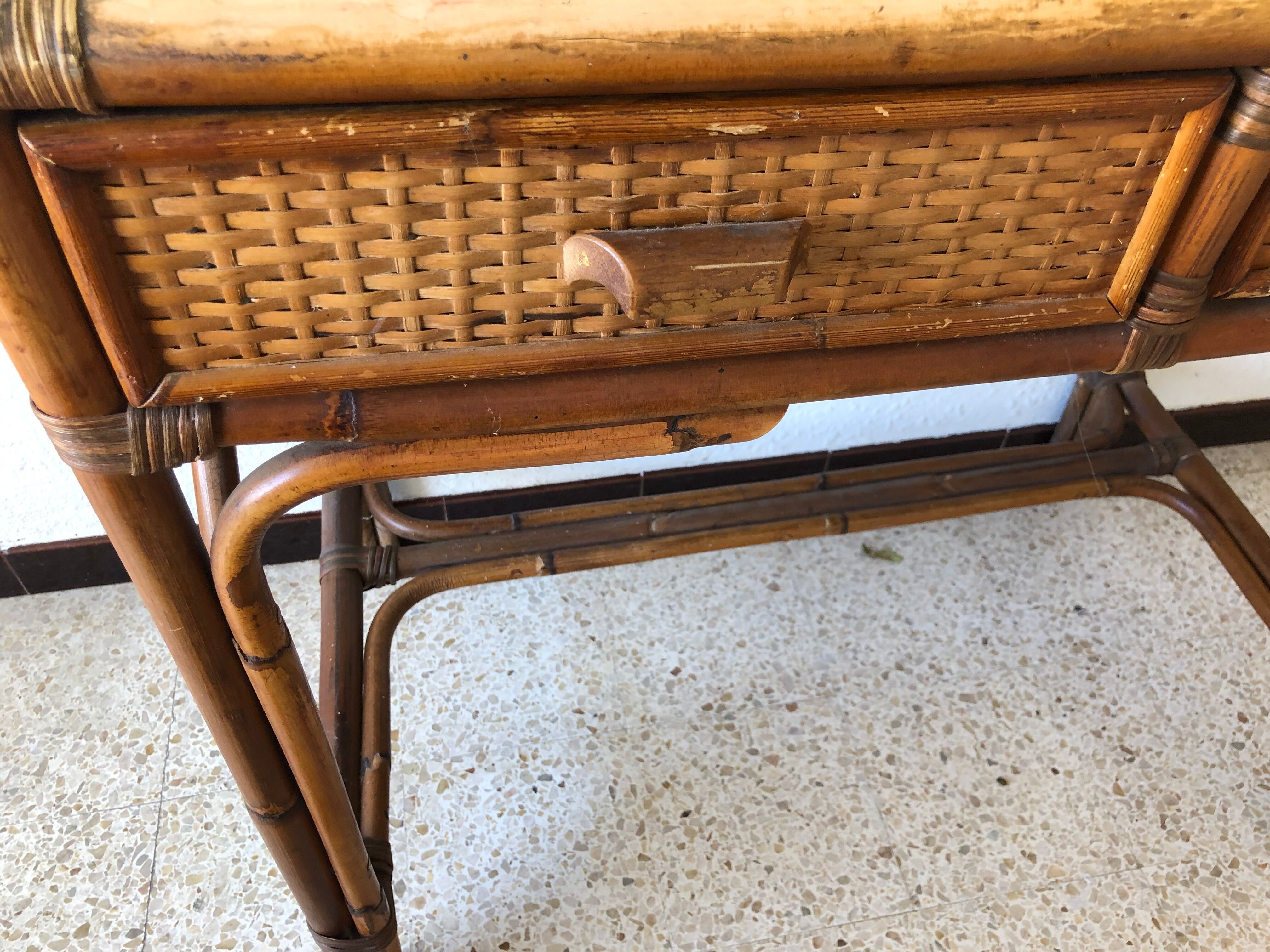 Console/small old desk in rattan