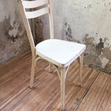 Set 4 white Baumann chairs