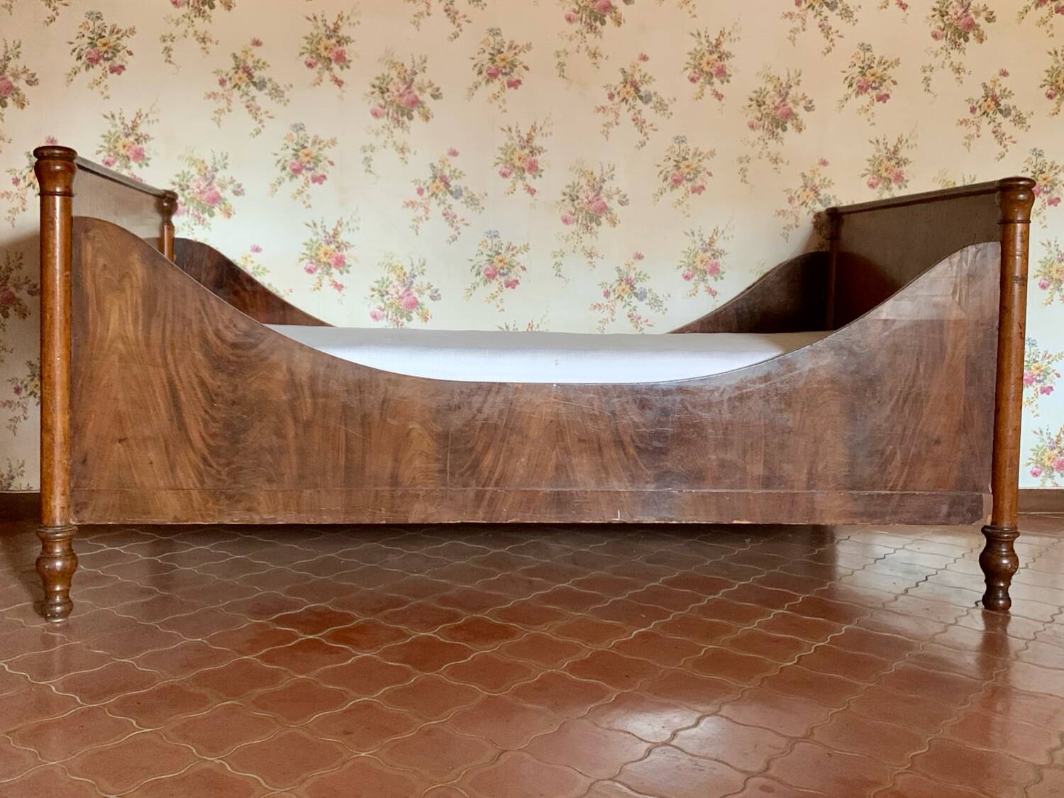 Antique Louis Philippe style sleigh bed in solid mahogany