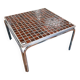 Vintage square coffee table with chrome legs and small tiled squares.