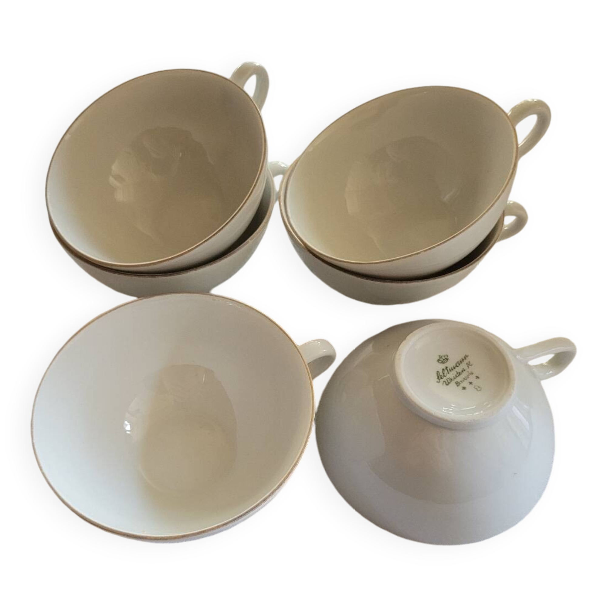 6 white and gold porcelain cups