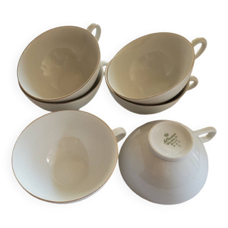 6 white and gold porcelain cups