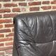 Pair of patinated leather club armchairs