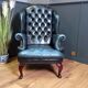 Blue chesterfield barrel back armchair