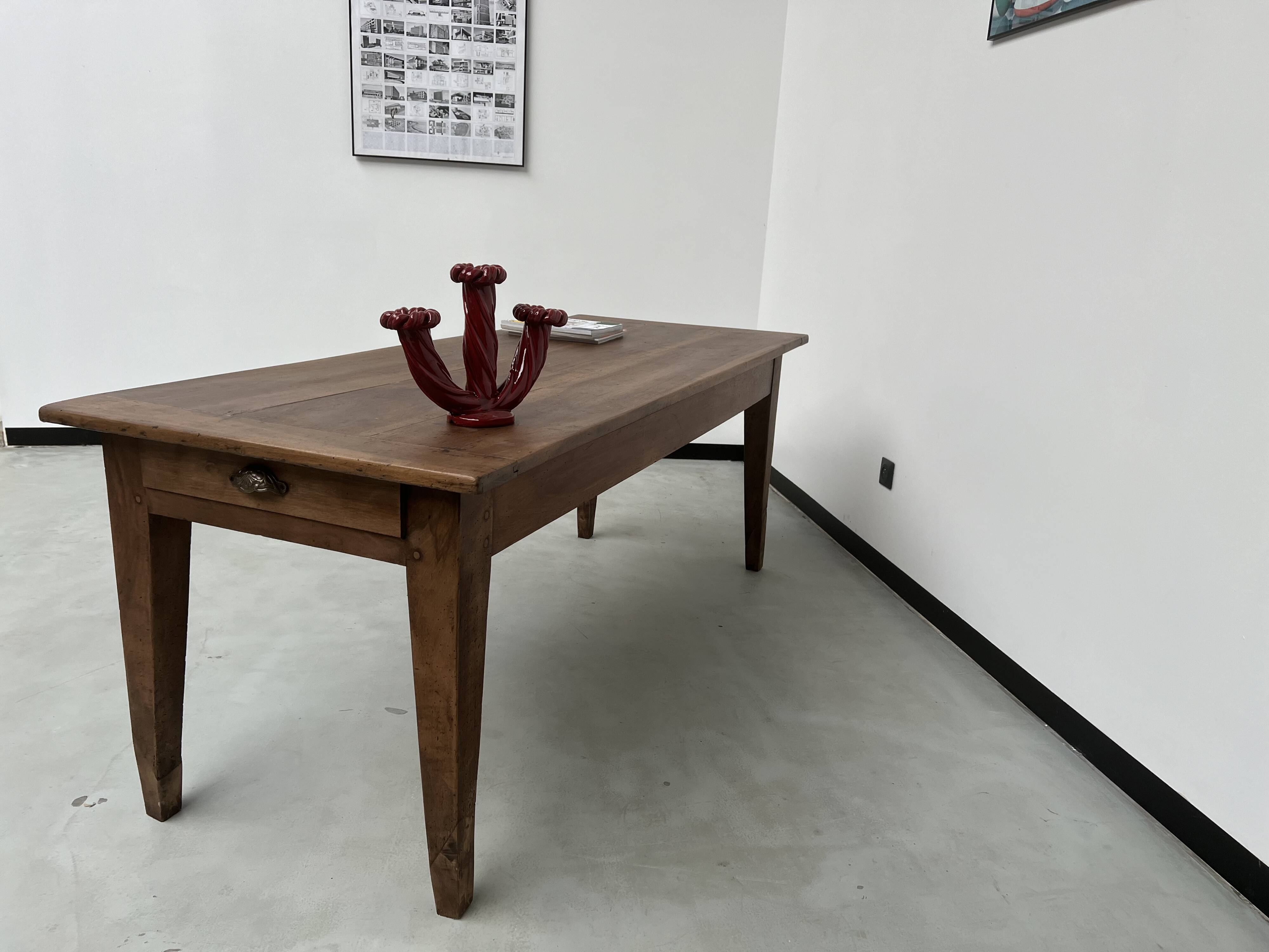 Solid walnut farmhouse table with spindle legs