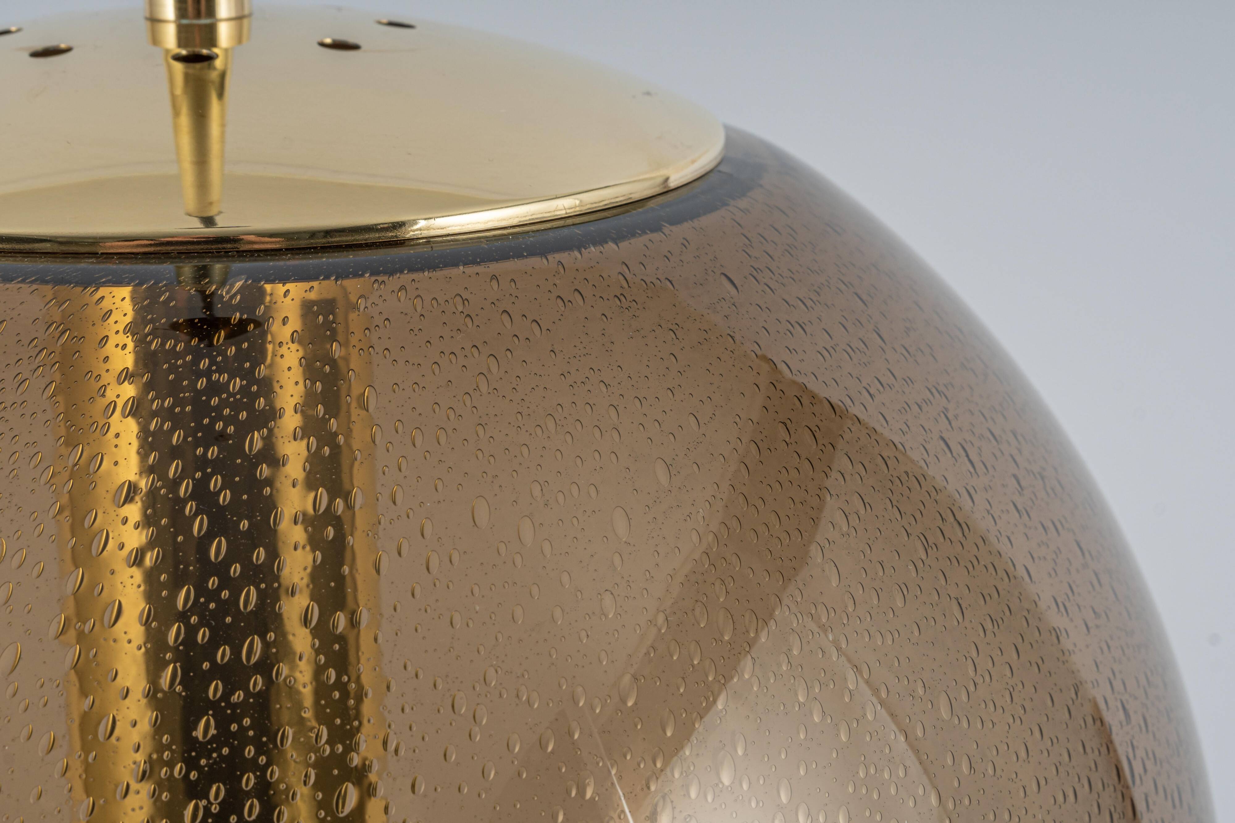 Large smoked glass ball pendant by Limburg with brass, Germany, 1970s.