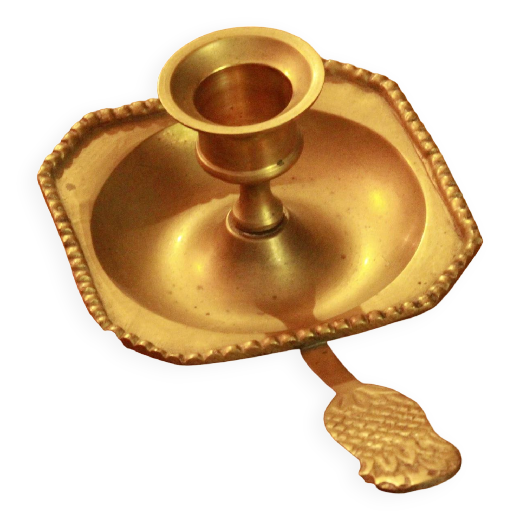 Old brass hand candle holder