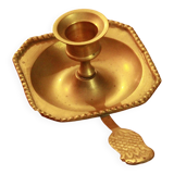 Old brass hand candle holder