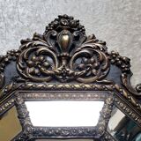 Old octagonal mirror with brass glazing beads