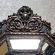 Old octagonal mirror with brass glazing beads
