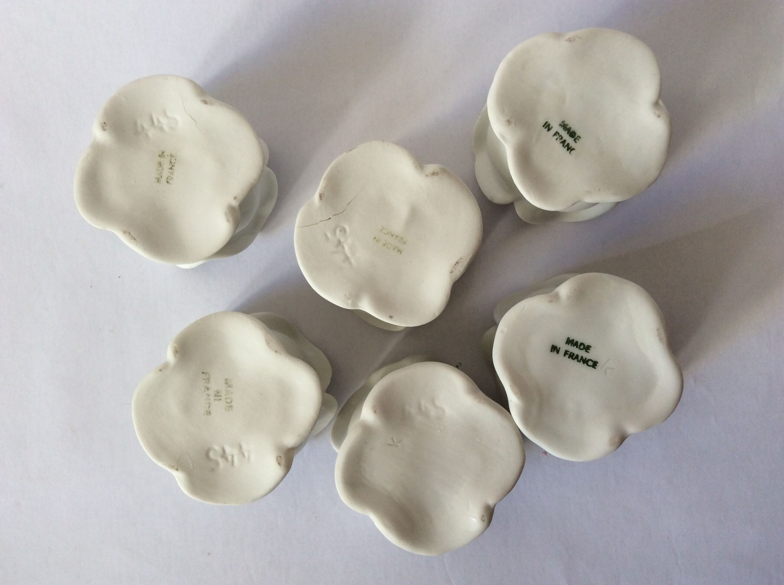 set of 6 pink candle holders in white porcelain