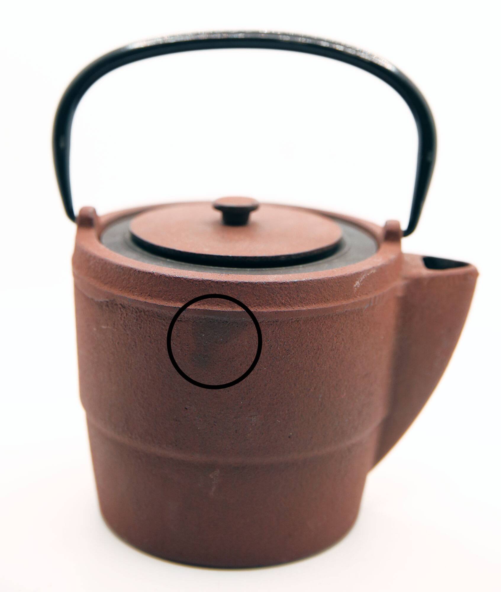 Cast iron chocolate teapot from Japan wabi sabi and its stainless steel filter