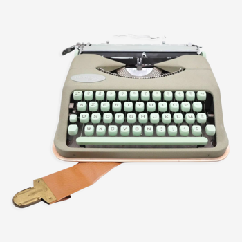 Typewriter hermes baby rocket lime green with its brown suitcase revised new ribbon