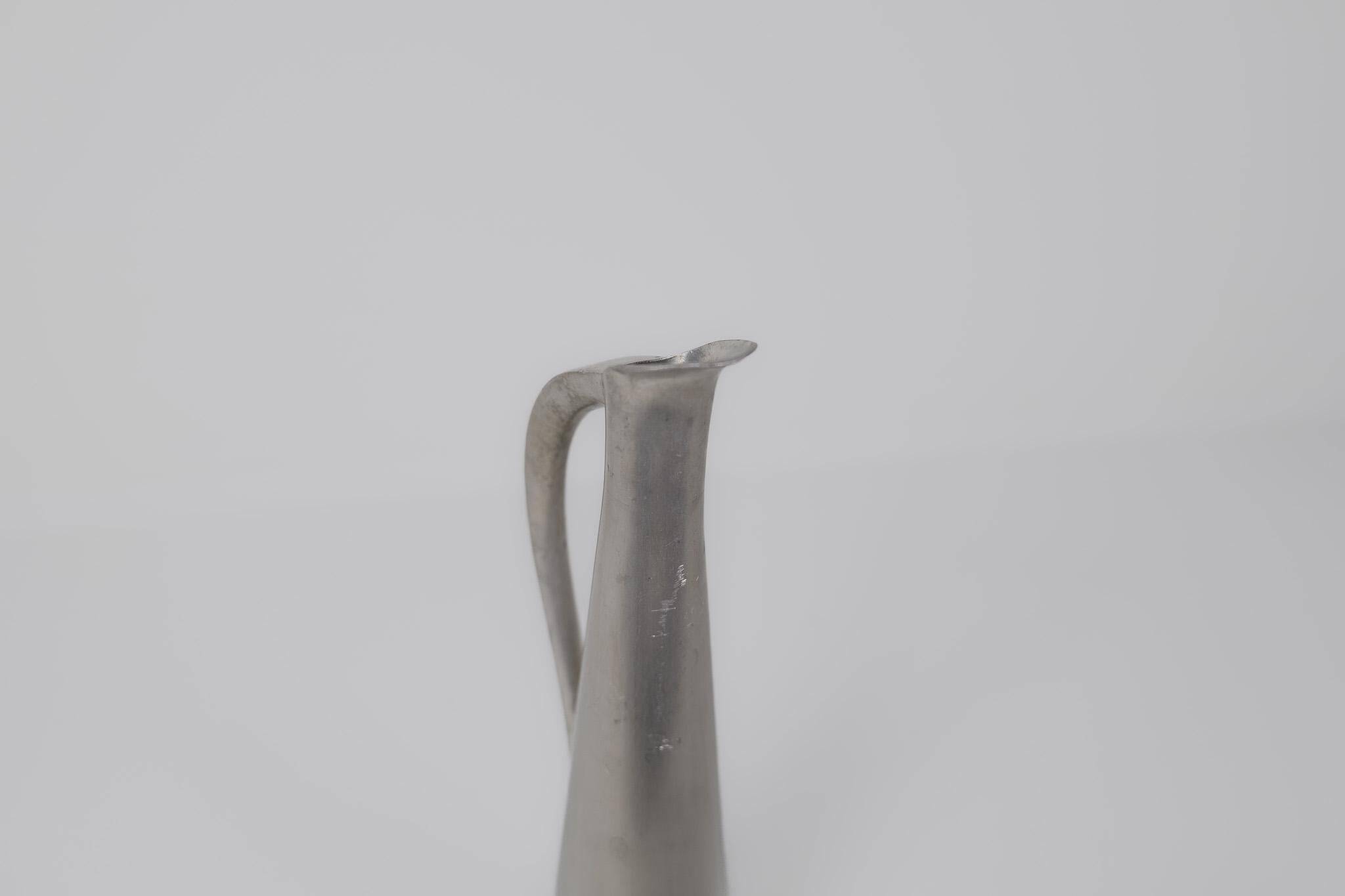 Sculptural Art Deco wine pitcher "Jomfruen" in pewter by Gunnar Havstad 1930s
