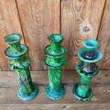 Trio of Tamegroute candlestick holders in enamelled ceramic.