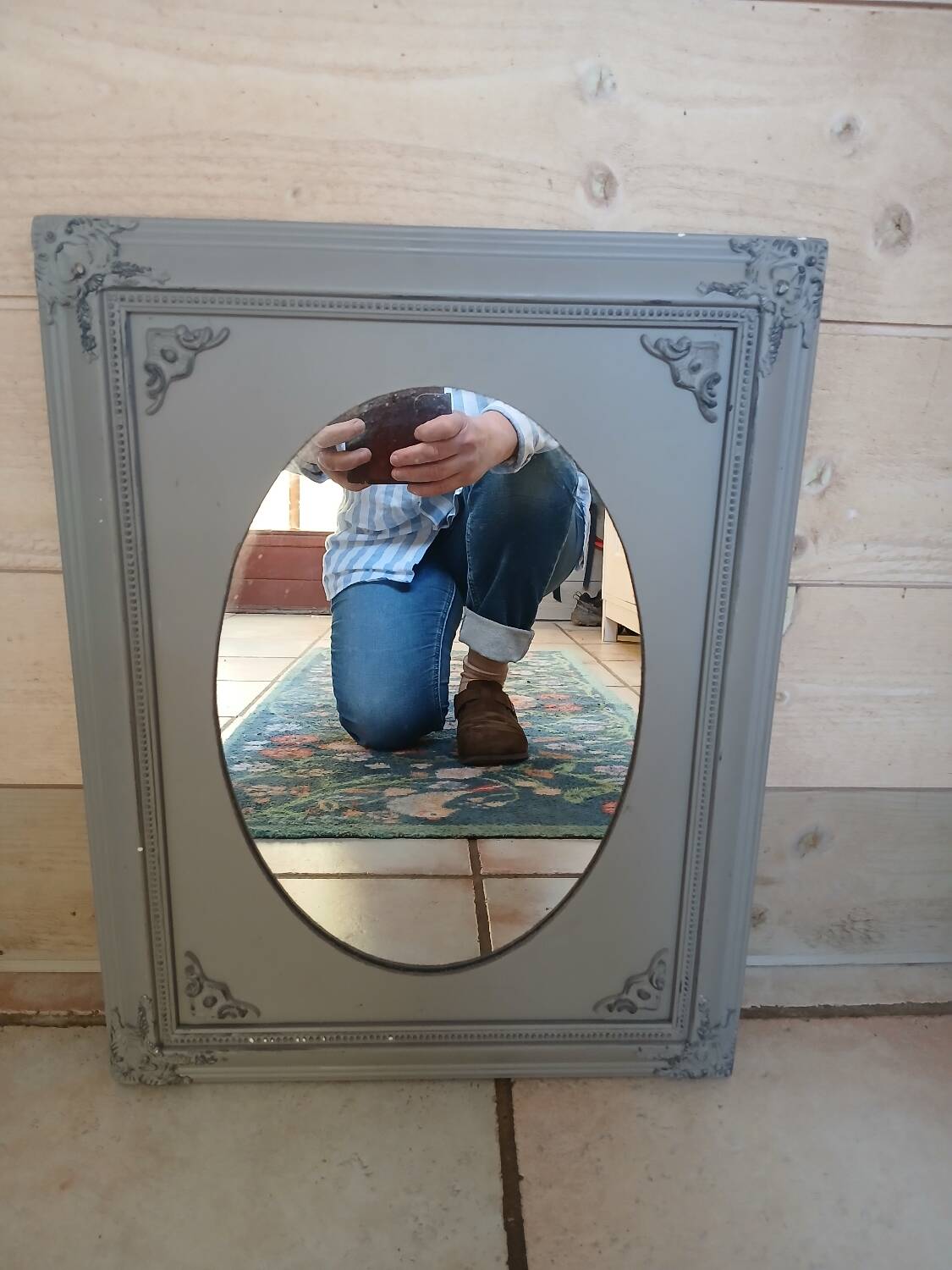 Mirror with a grey wooden frame