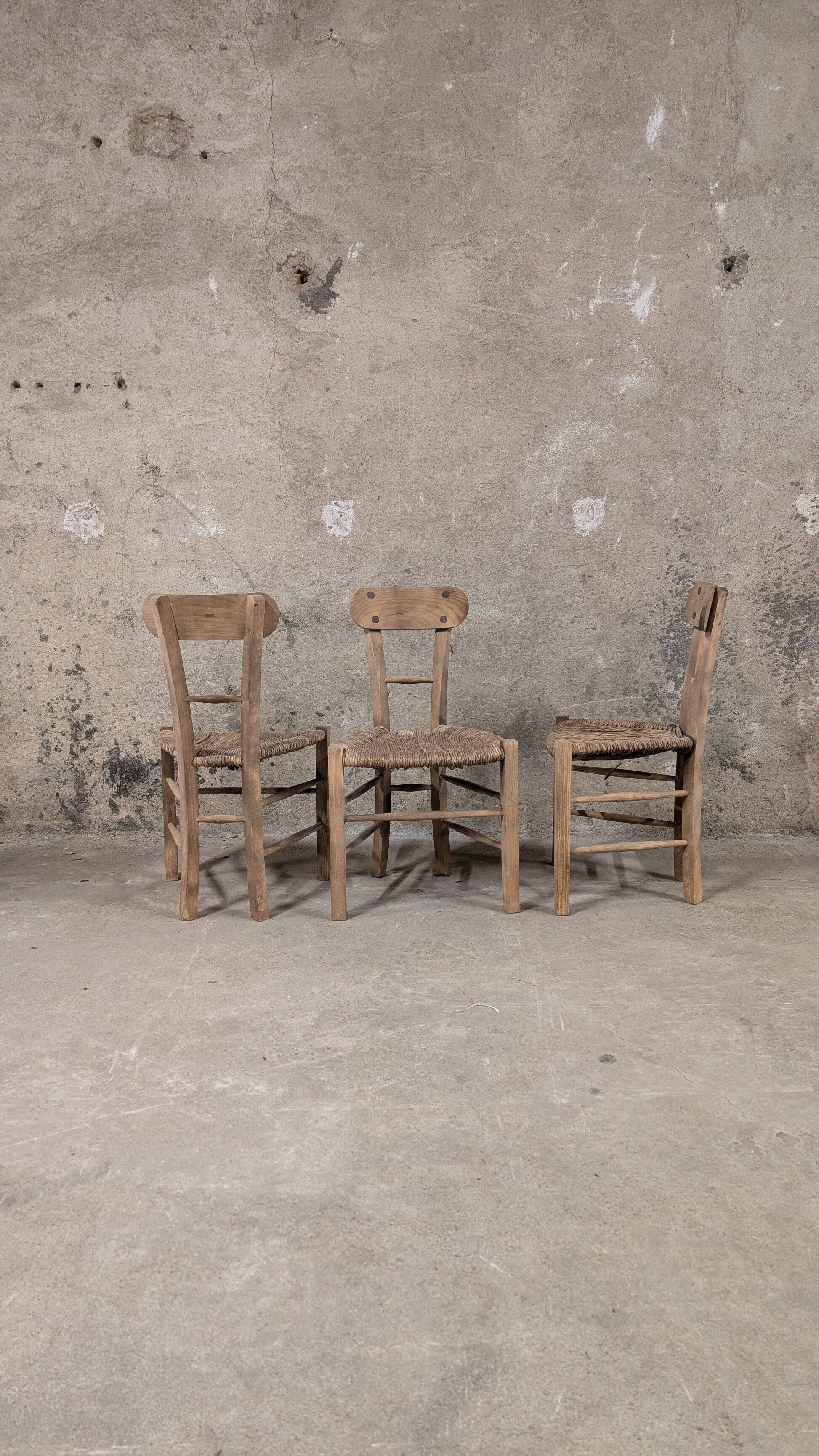 Set of 3 rustic wooden and woven straw chairs