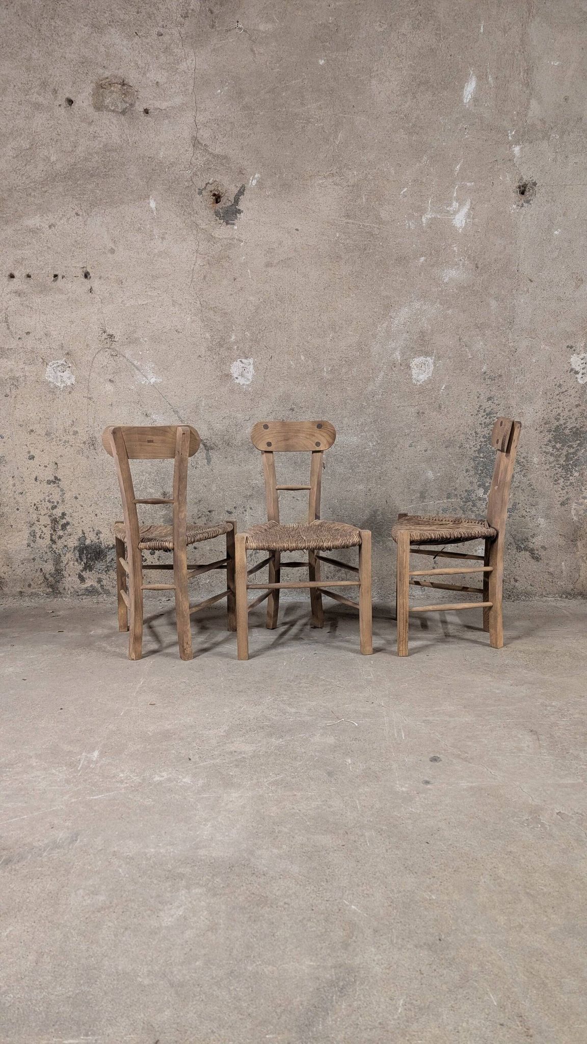 Set of 3 rustic wooden and woven straw chairs