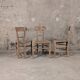 Set of 3 rustic wooden and woven straw chairs