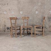 Set of 3 rustic wooden and woven straw chairs