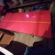 Extendable table + drawer in red Formica – Vintage