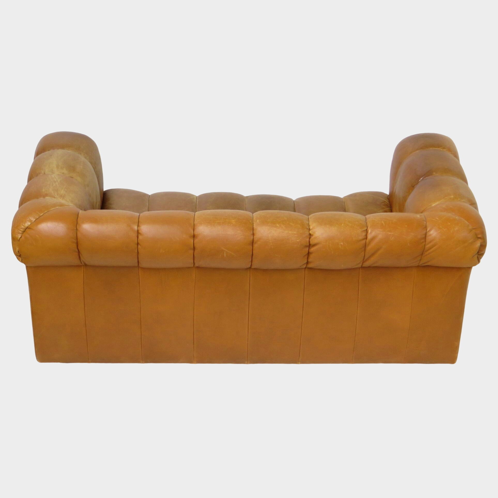 Mid century 2.5 seater sofa in thick cognac buffalo leather, 1970s.