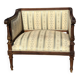 Low armchair in finely carved wood in the Louis XVI style from the 19th century