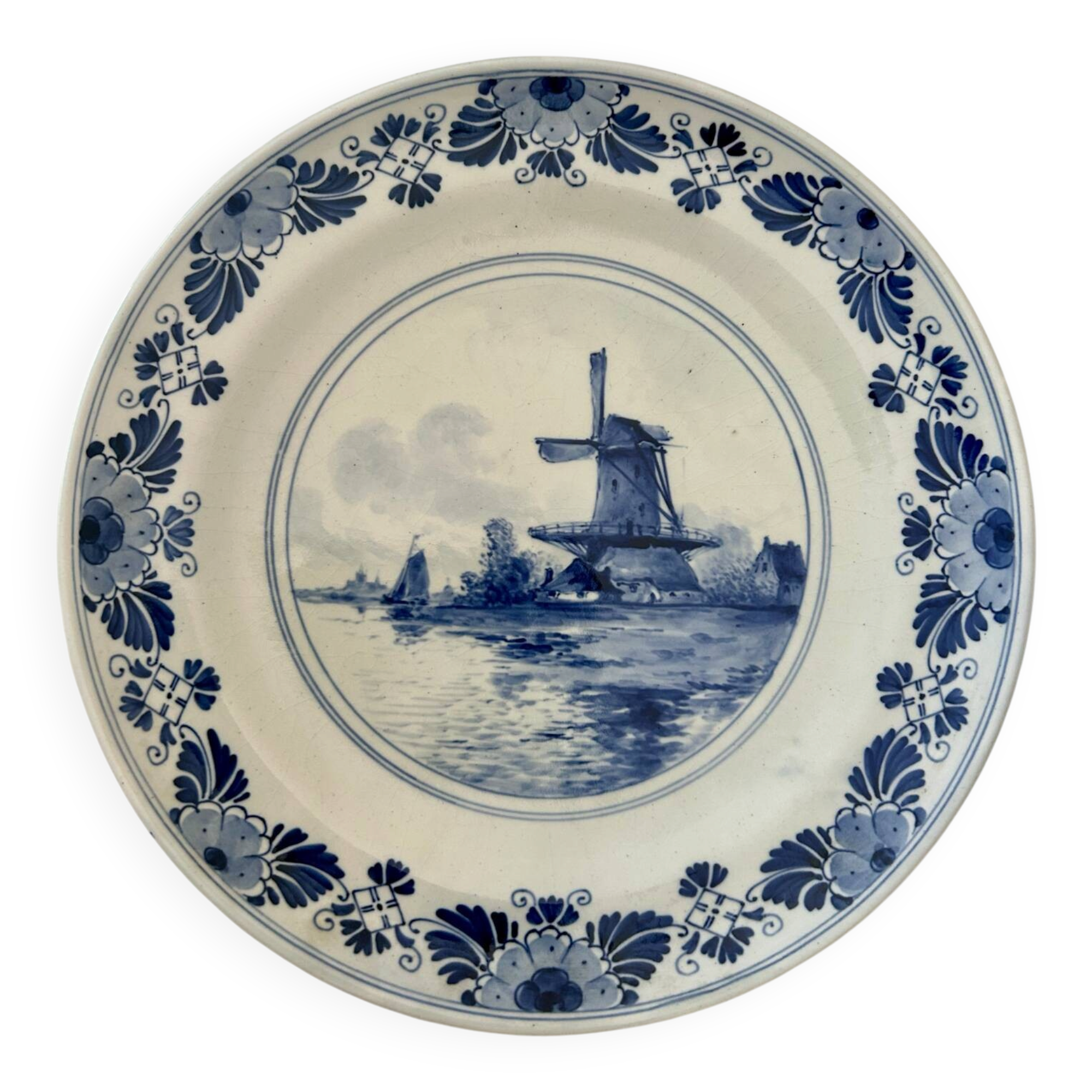 Old wall plate in blue Delft pottery