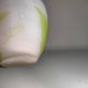 Small E. Gallé vase, "star" signature, light green tone on white background.