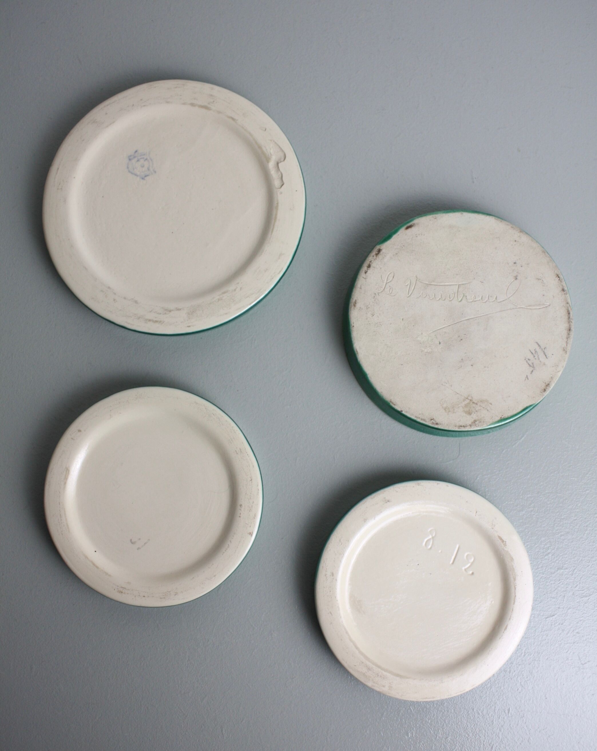 Set of 4 coasters in glass in green earthenware