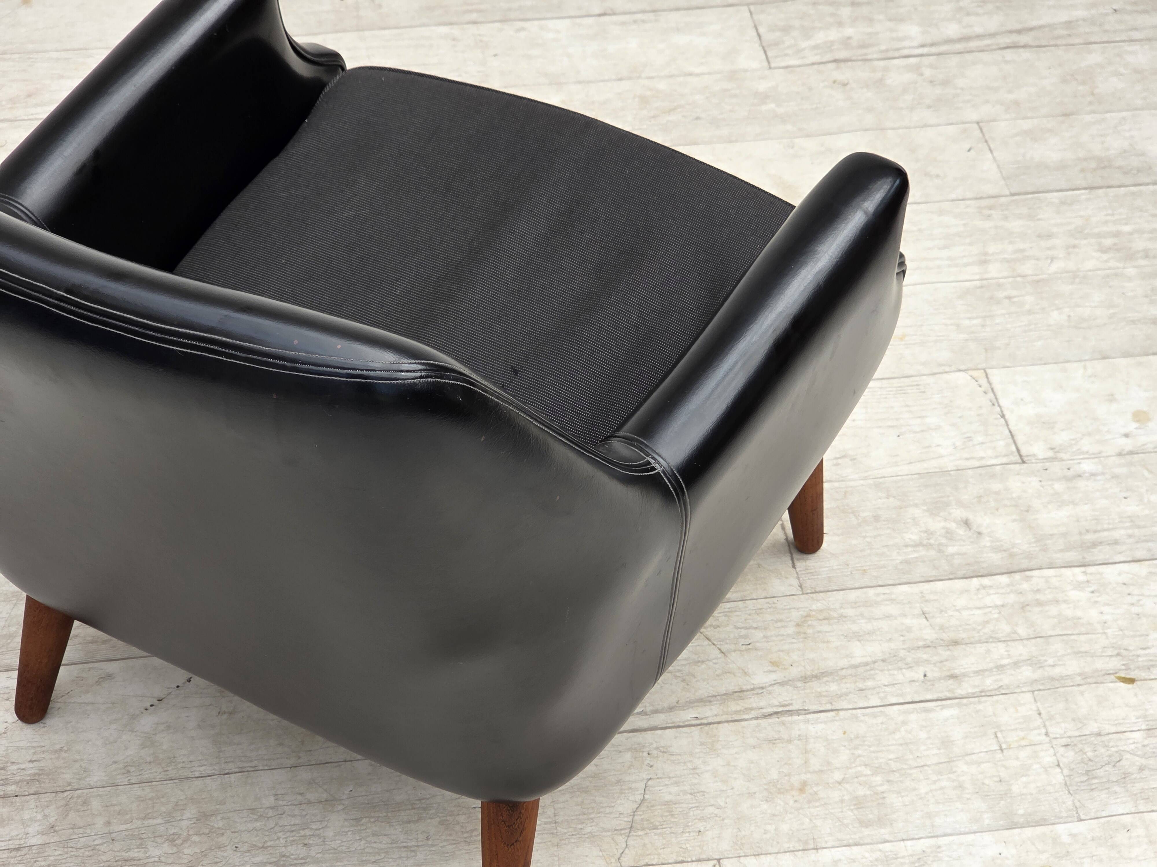 1970s, Danish armchair, artificial leather, teak wood legs.
