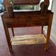 Walnut and marble dressing table, mercury mirror, circa 1850.