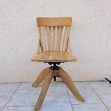 Swivel office chair in blond oak circa 1930