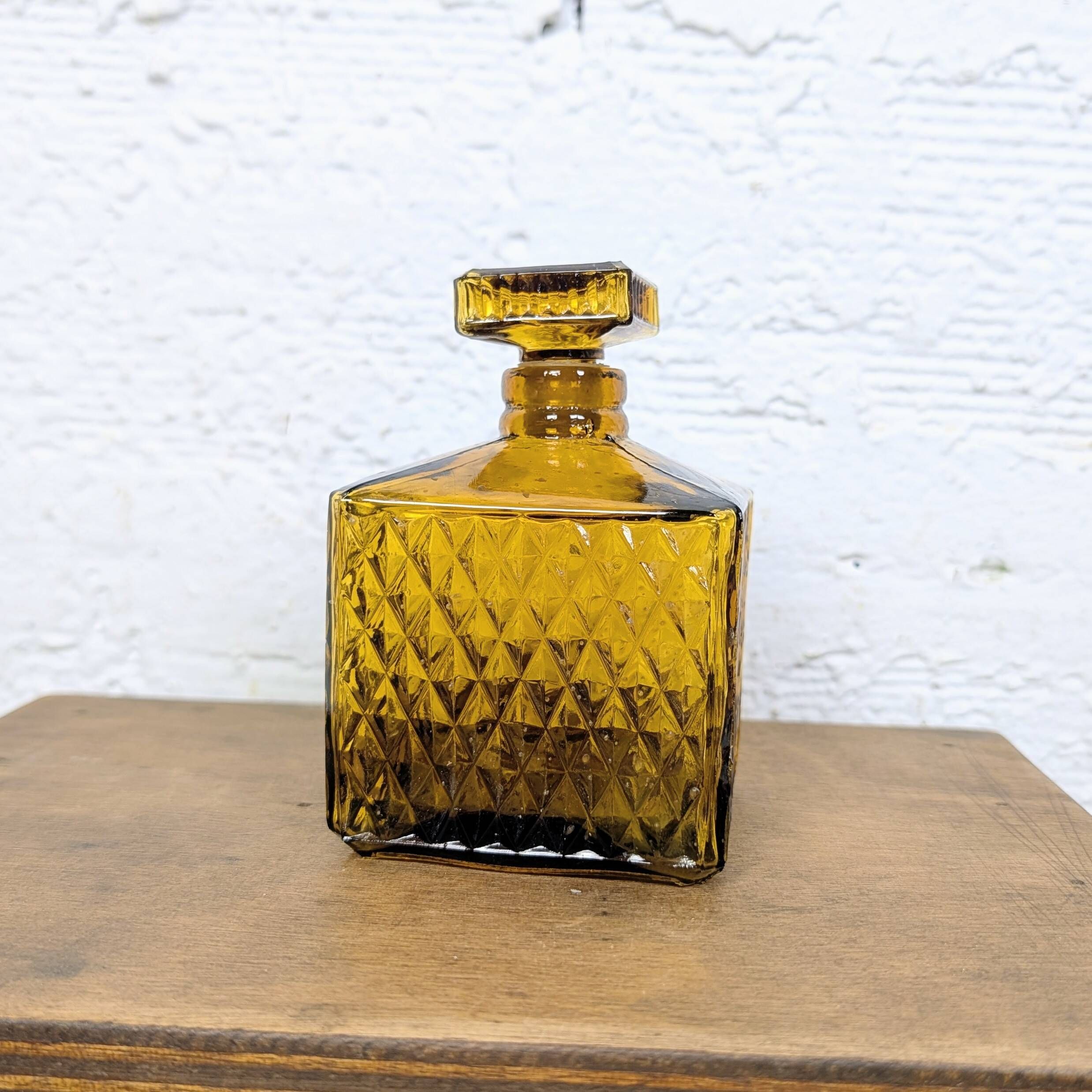 Amber glass liqueur carafe with diamond pattern