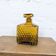 Amber glass liqueur carafe with diamond pattern