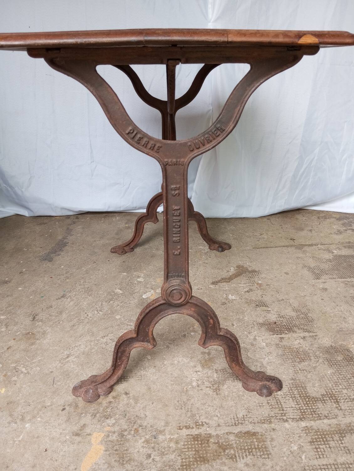 Antique bistro table with lion paws