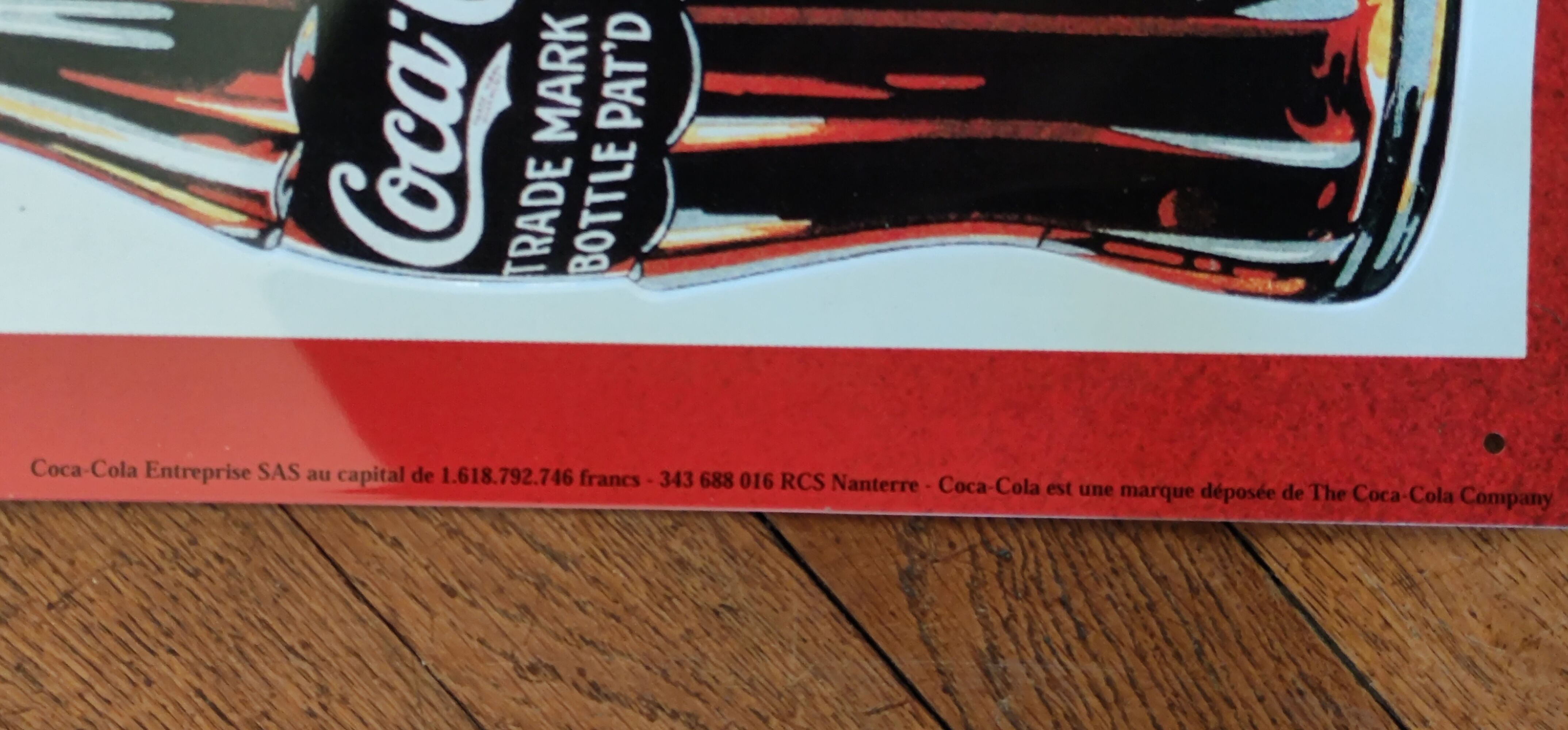 Vintage Coca Cola advertising plaque