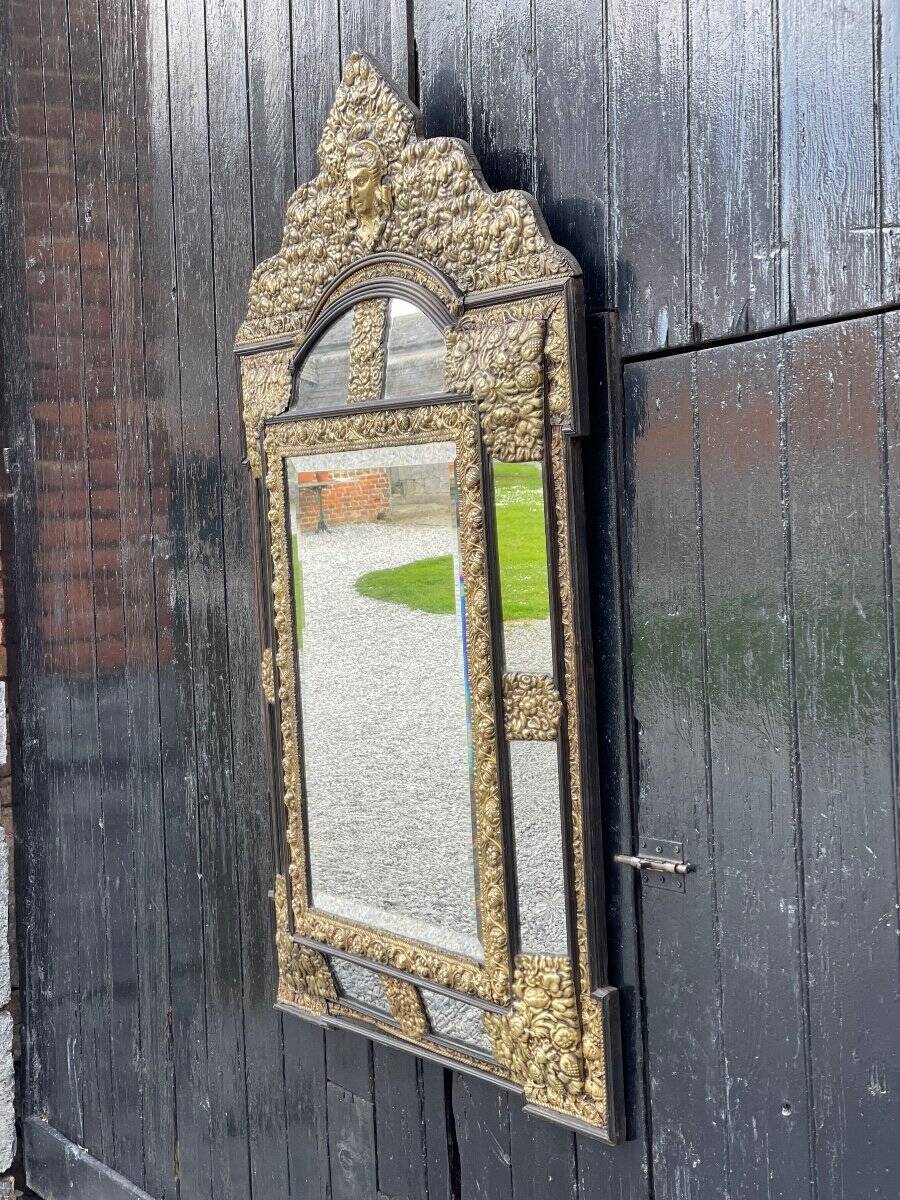 Brass and blackened wood mirror in Louis XVI style circa 1880.