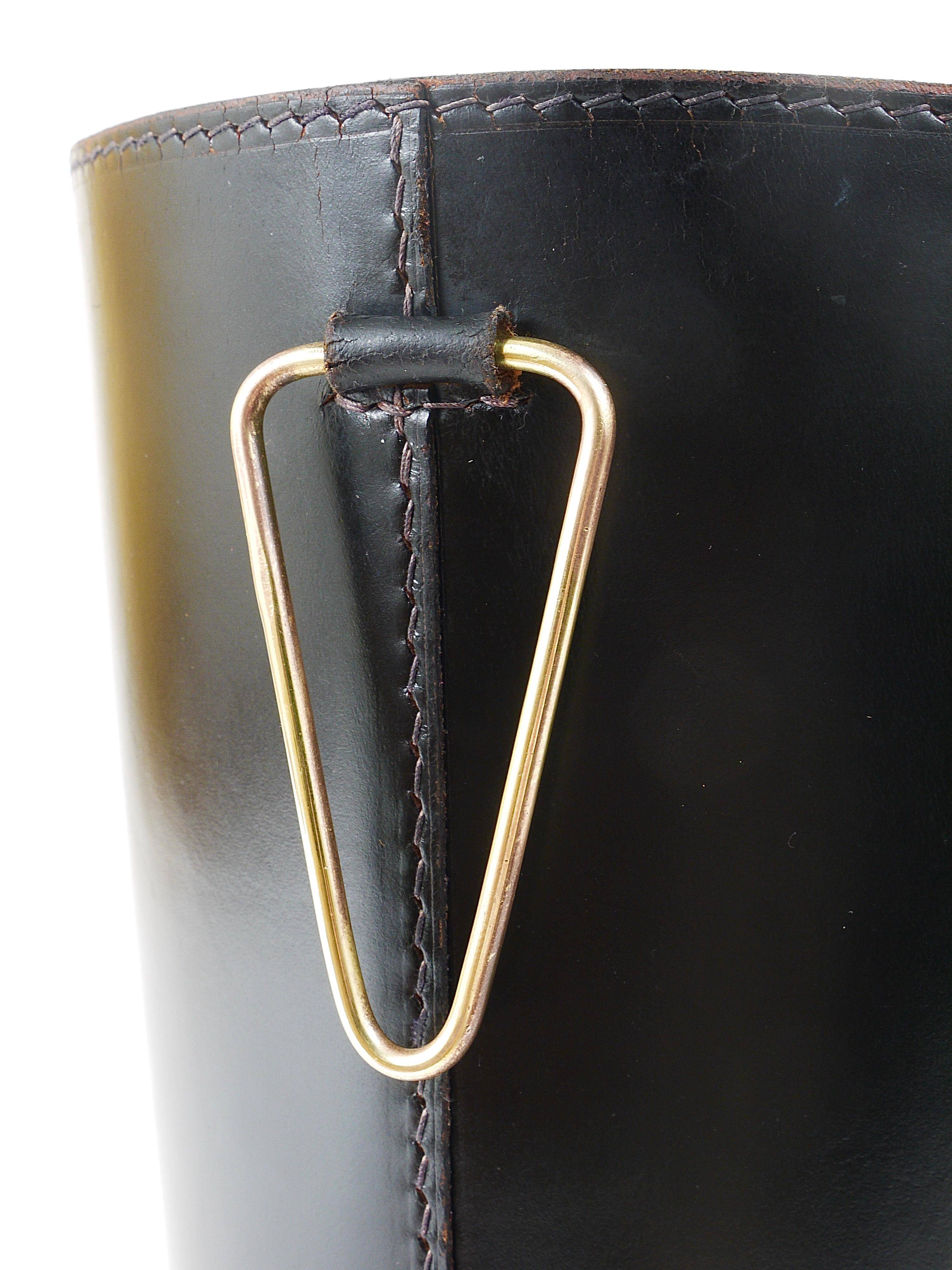 Mid-Century paper bin by Carl Auböck in black leather and brass, Austria, 1950s.