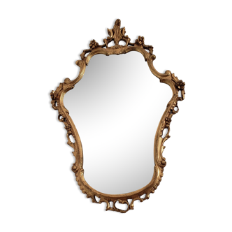 Beveled mirror and gilded wood