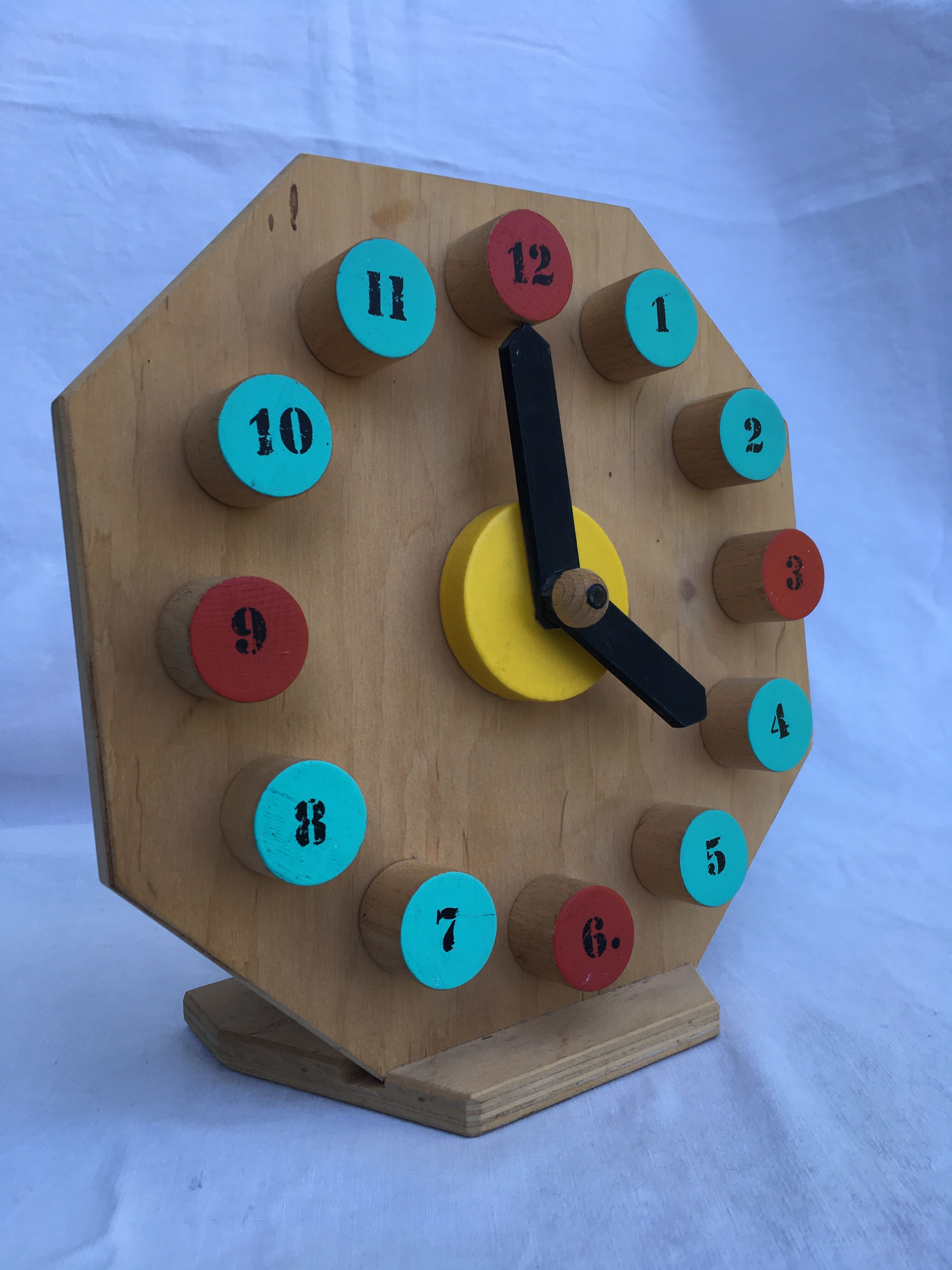 Painted wooden toy clock