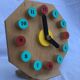 Painted wooden toy clock